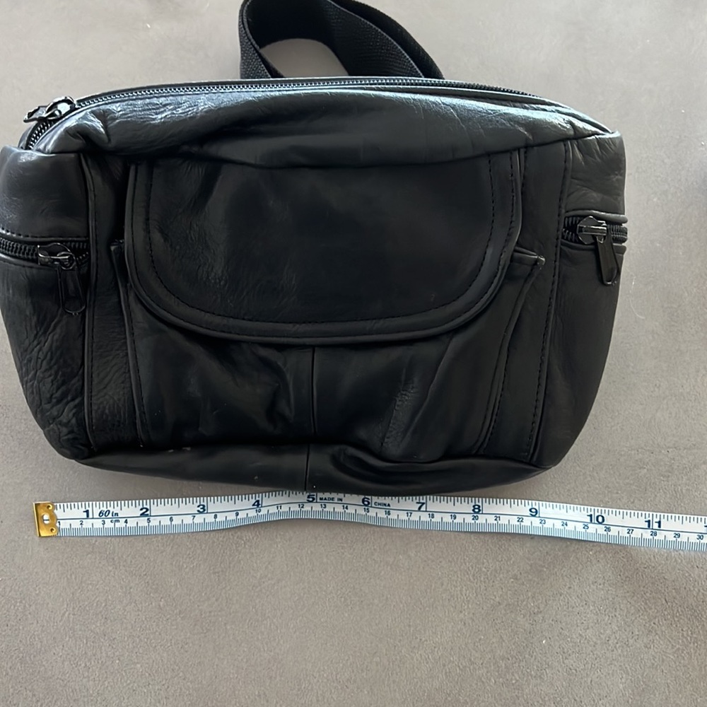 Like new black leather Fanny pack with multiple zippered compartments. - Picture 7 of 8
